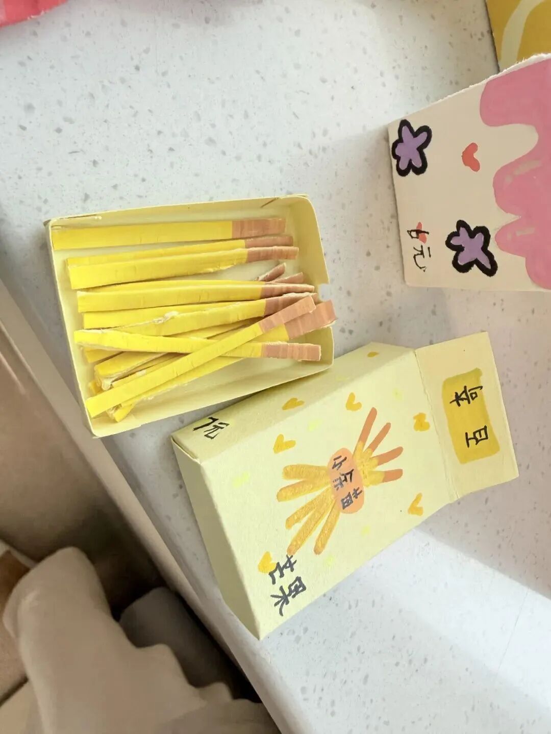Paper "little snacks" she made by hand in the ward