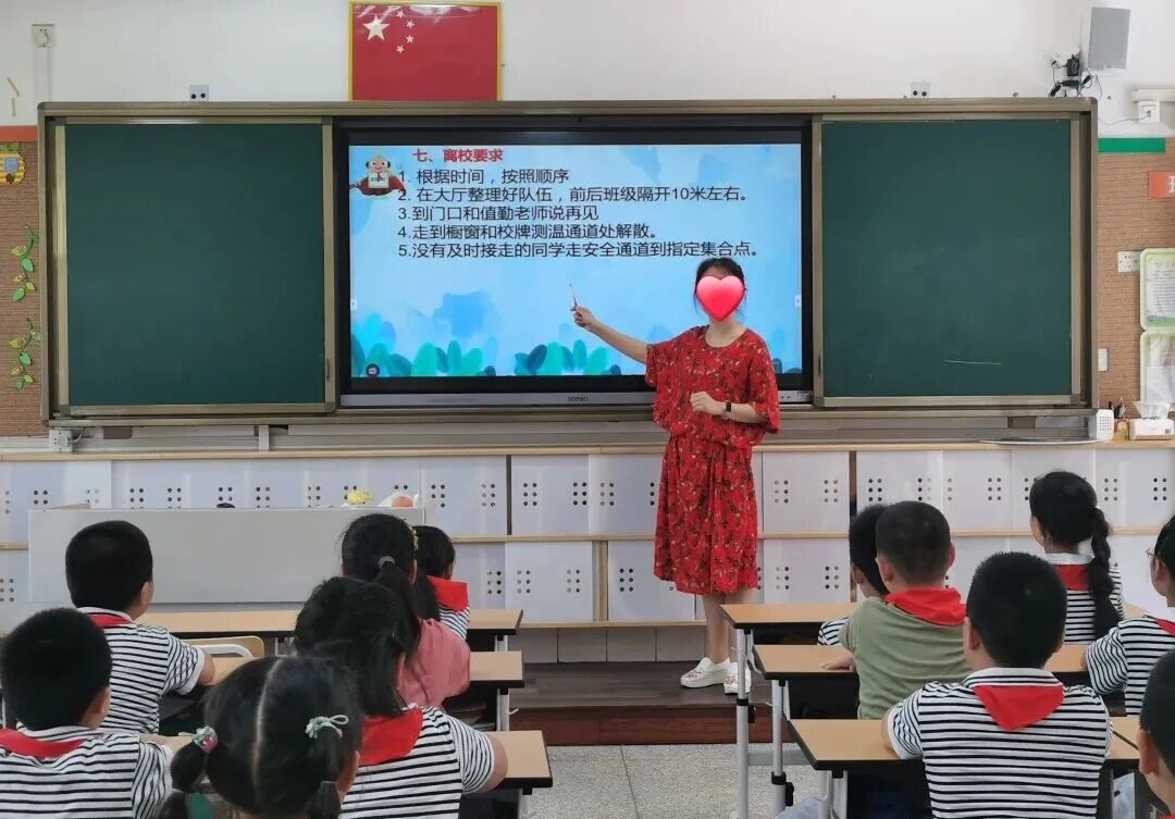 2021 — Ms. Zhang teaching her students in the classroom.